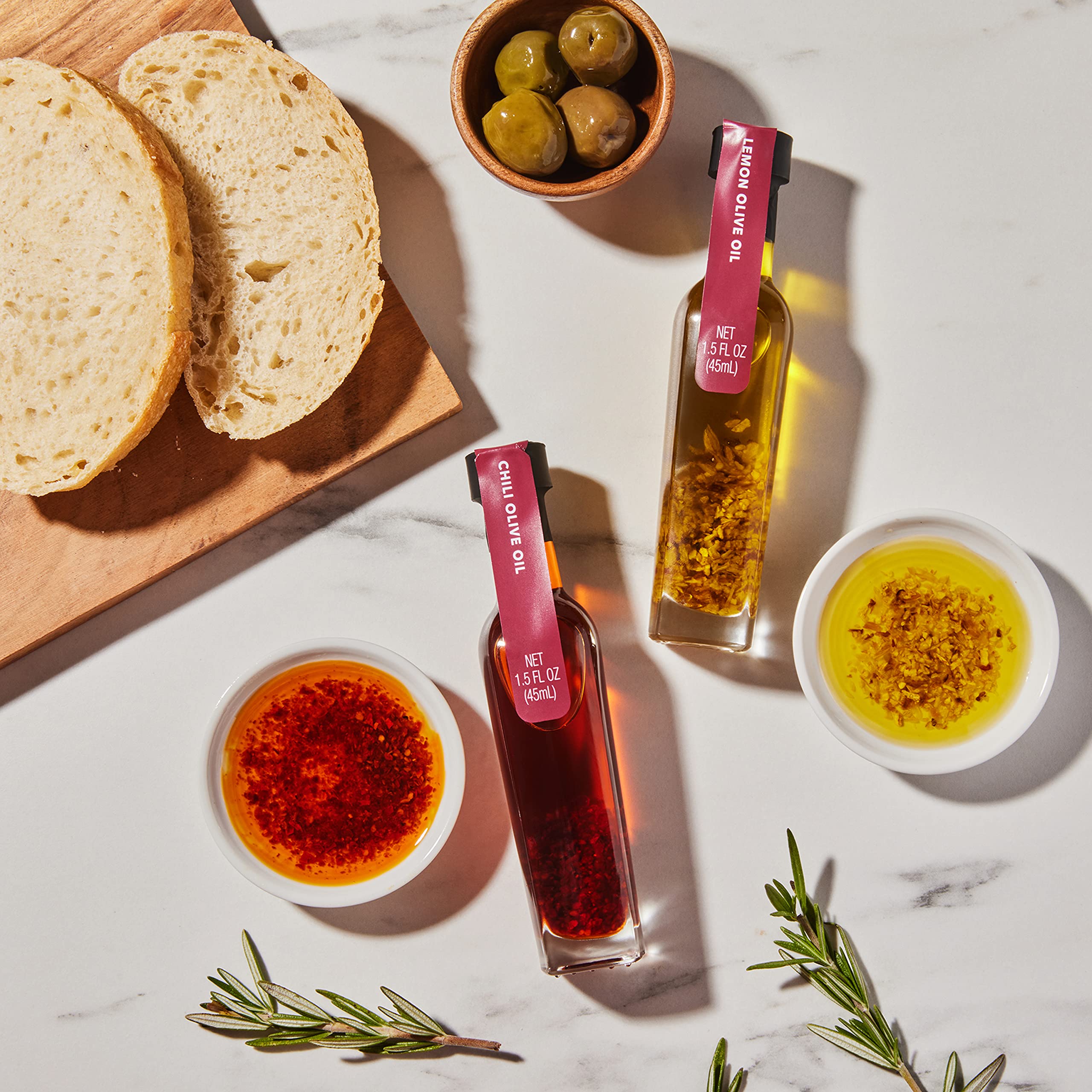 Thoughtfully spicy garlic olive oil bottle adds savory warmth for pasta.