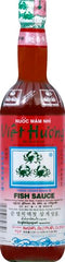 Three Crabs Fish Sauce pouring shot highlighting liquid for seasoning.