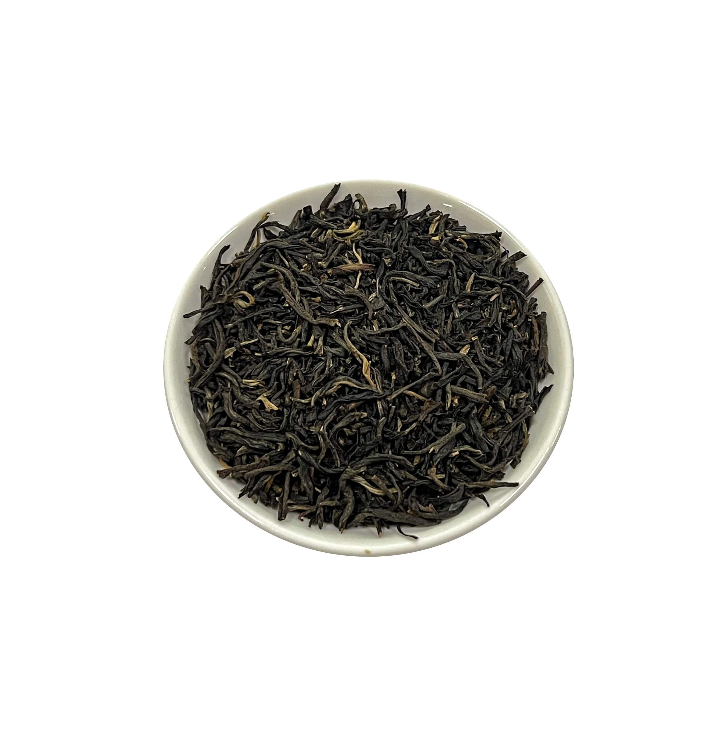 Close-up of Tian Hu Shan black tea leaves shows premium whole leaves.