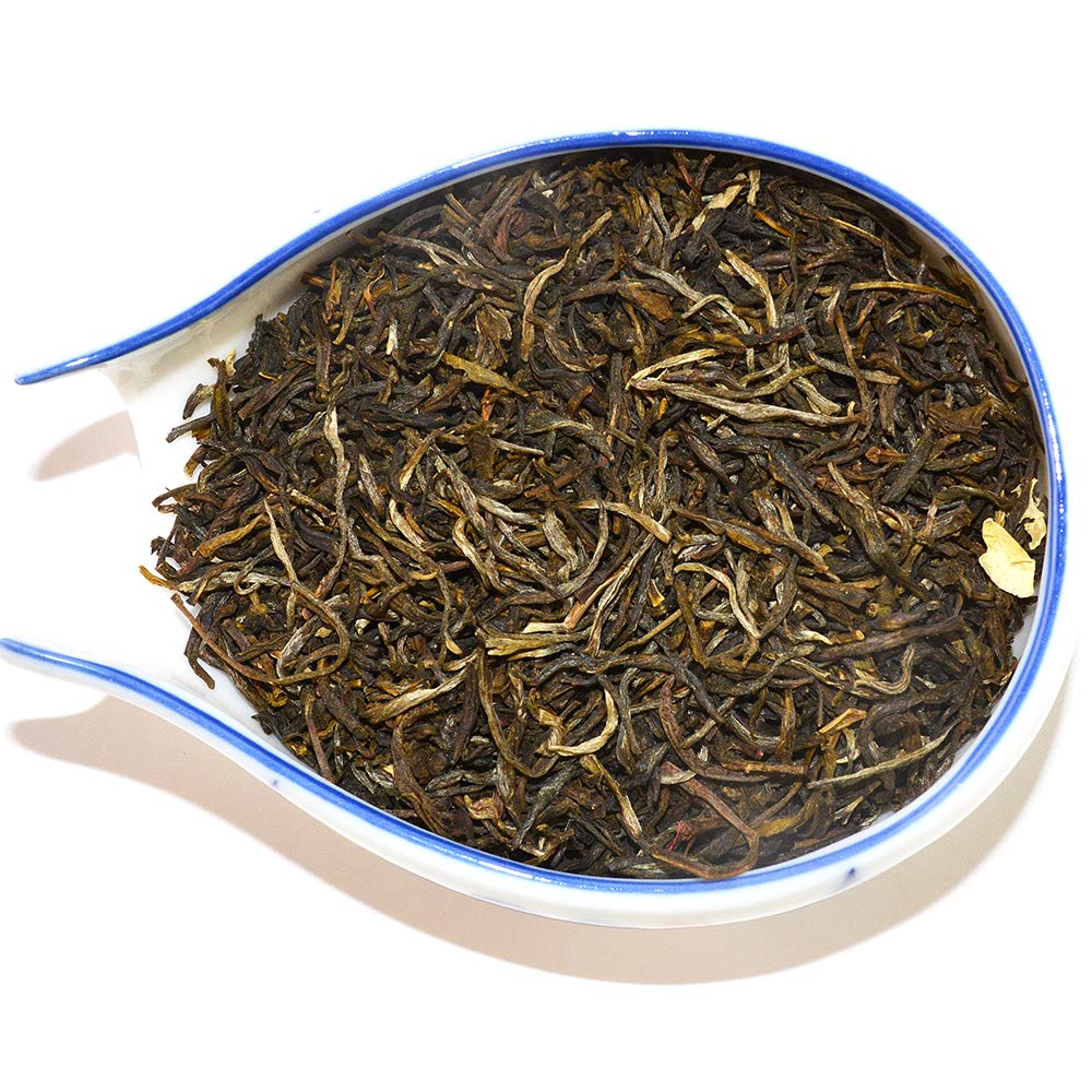 Brewing in a cup releases warm jasmine aroma and bright liquor.