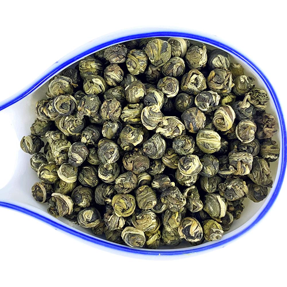 Tian Hu Shan pearl tea unfurling suggests multiple infusion possibilities.