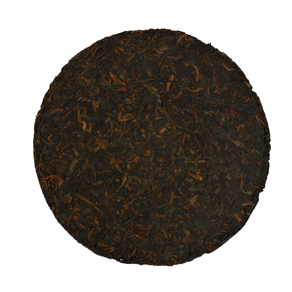 Tian Hu Shan tea leaves with cake side suggests premium craftsmanship.