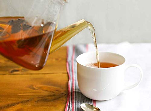 Tick Tock Teas Rooibos leaves and bergamot oil close-up