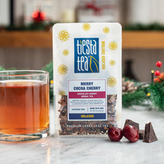 Tiesta Tea Merry Cocoa Cherry leaves close-up with cocoa shells and hibiscus