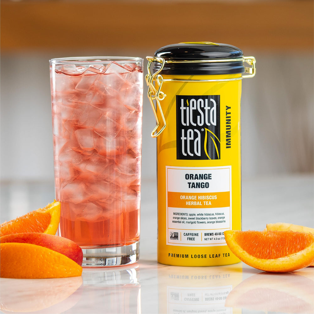Tiesta Tea Orange Tango brewed cup reveals citrus and hibiscus balance.