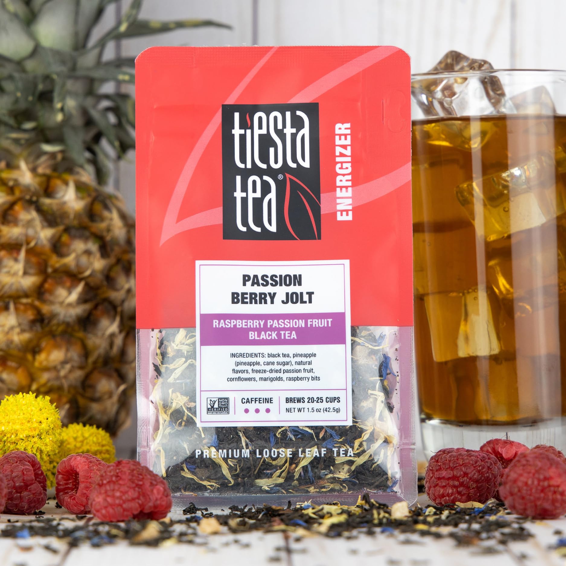 Tiesta Tea Passion Berry Jolt hot brew cup showing rich color and aroma