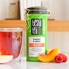 Tiesta Tea Peaches N’ Green tin label close-up highlighting premium loose leaf quality