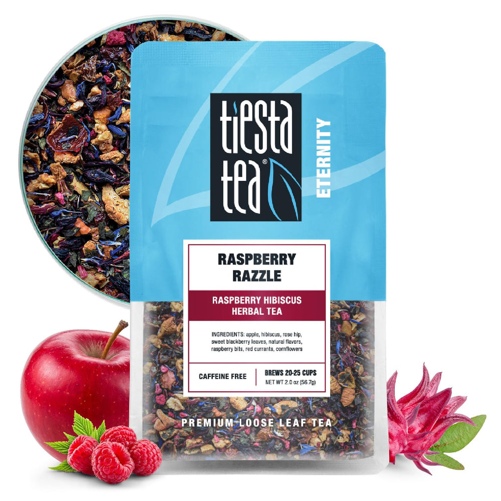 Tiesta Tea Raspberry Razzle loose leaf in a tin showing vibrant berry aroma and caffeine-free refresh