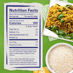 Fragrant steam rises from Tilda Pure Basmati rice, showcasing fluffy texture