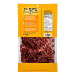 Tillamook Honey Glazed Beef Jerky Slices Closeup showcases tender strips and glossy glaze.