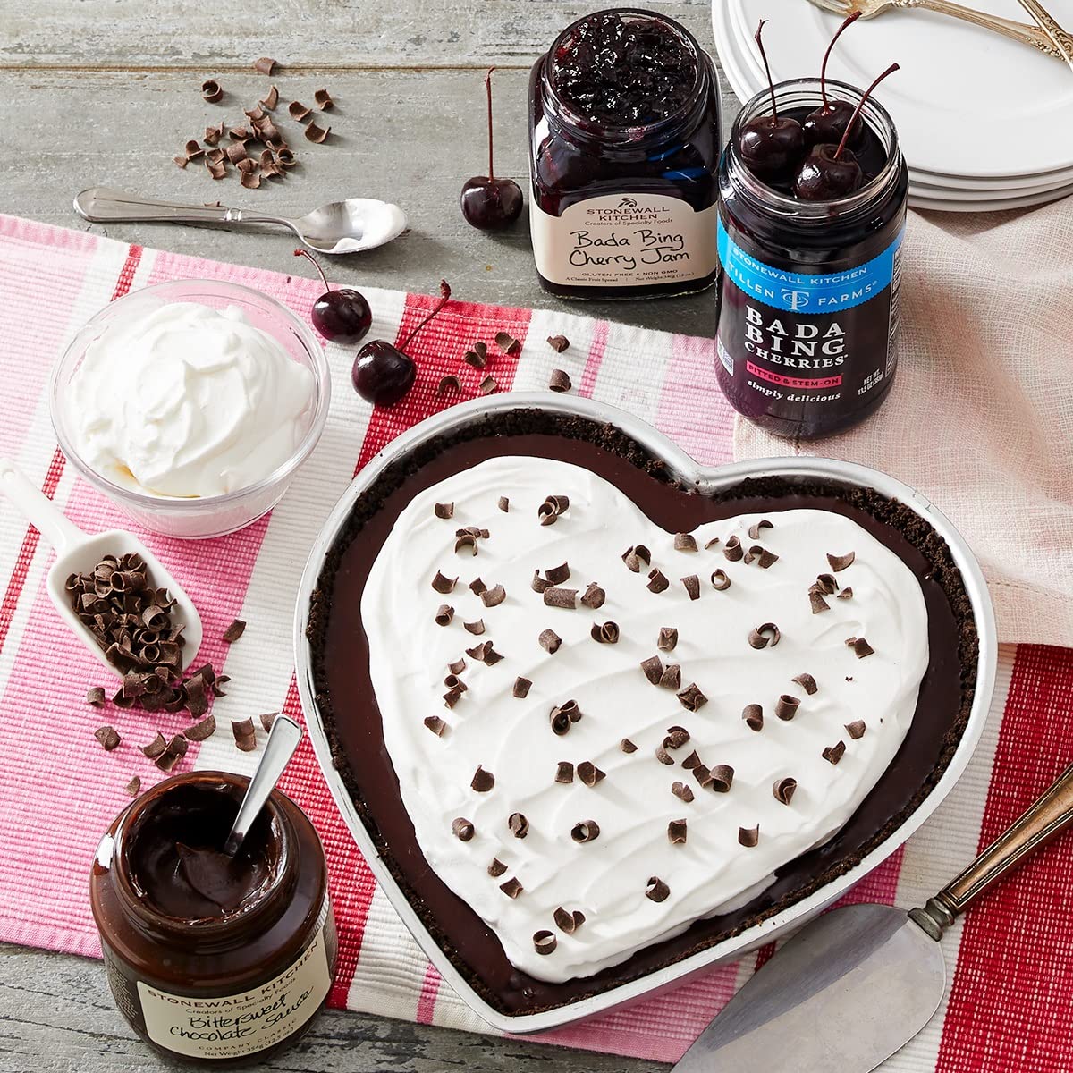 Tillen Farms Bourbon Bada Bing cherries on a cheese board for elegant pairings.