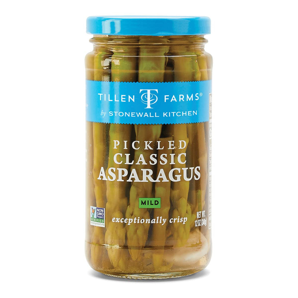 Close-up of crunchy asparagus spears in a jar, garlic-infused tang.