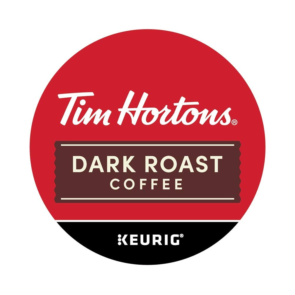 A steaming cup of Tim Hortons dark roast coffee on a saucer