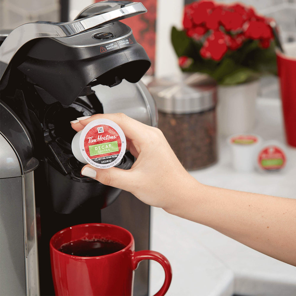 Red Tim Hortons decaf K-Cup pods, convenient for fast cafe-style cups.