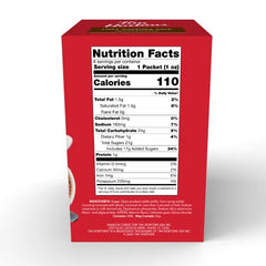 Tim Hortons hot cocoa mix packet dispensing into mug for easy preparation.