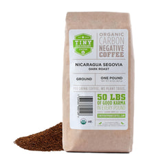 Tiny Footprint Coffee Nicaragua Segovia dark roast bag shows organic shade-grown origin and label
