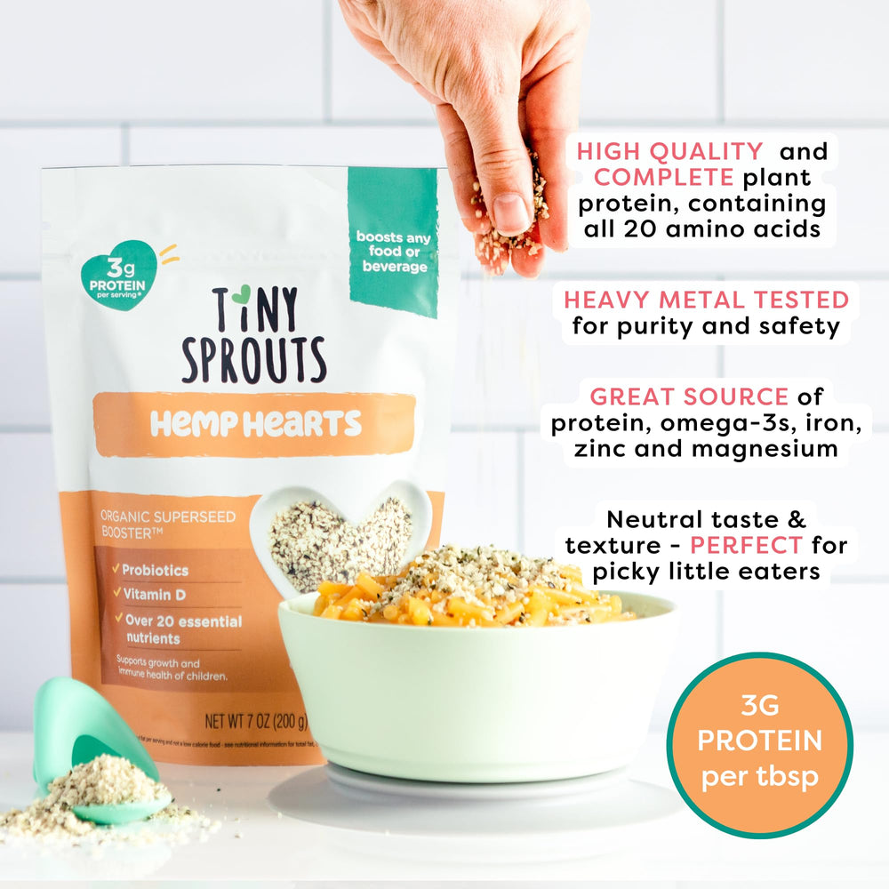 Tiny Sprouts Measuring spoon scoops hemp hearts for easy serving.