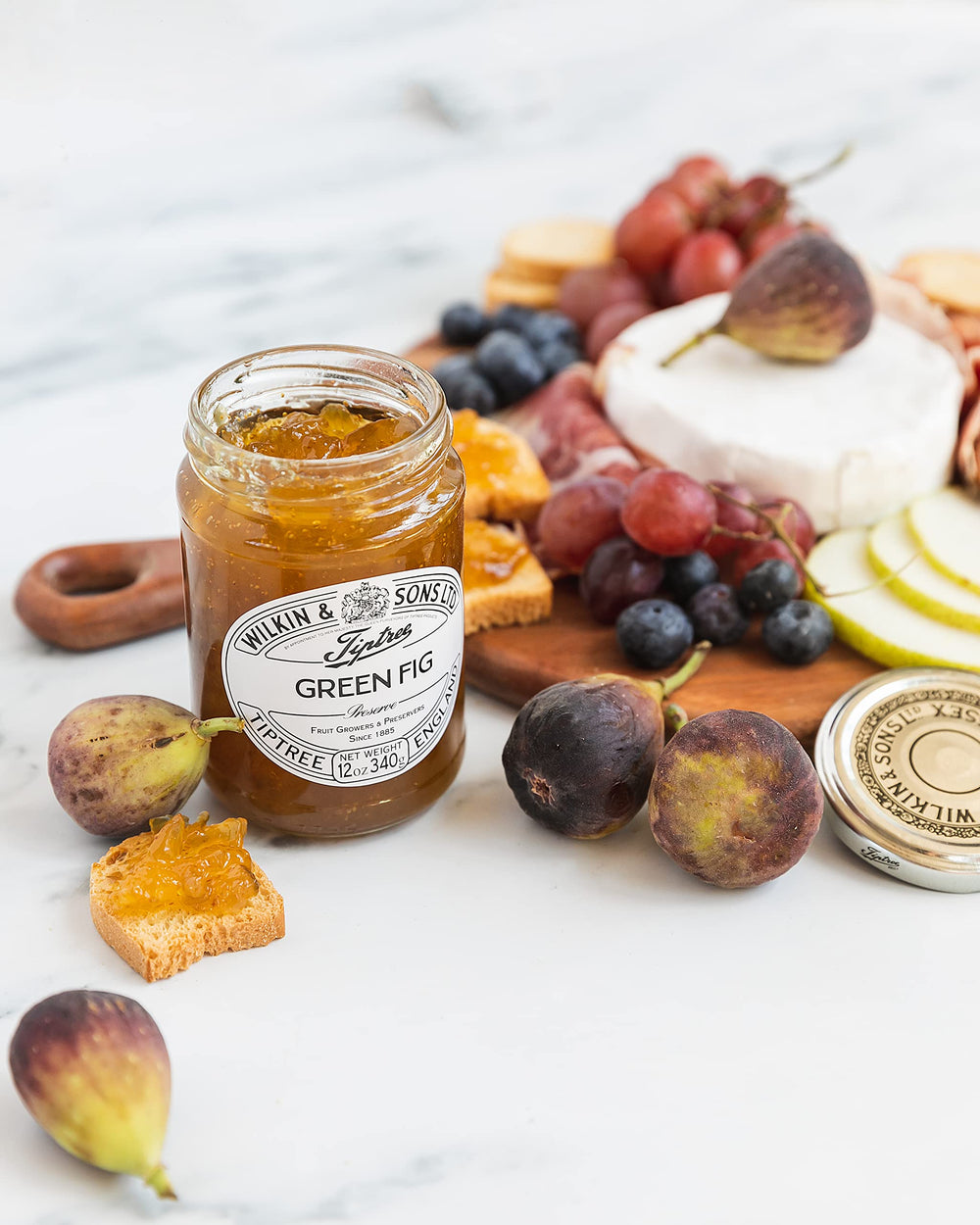 Tiptree Green Fig Preserve on toast, an inviting breakfast or snack spread.