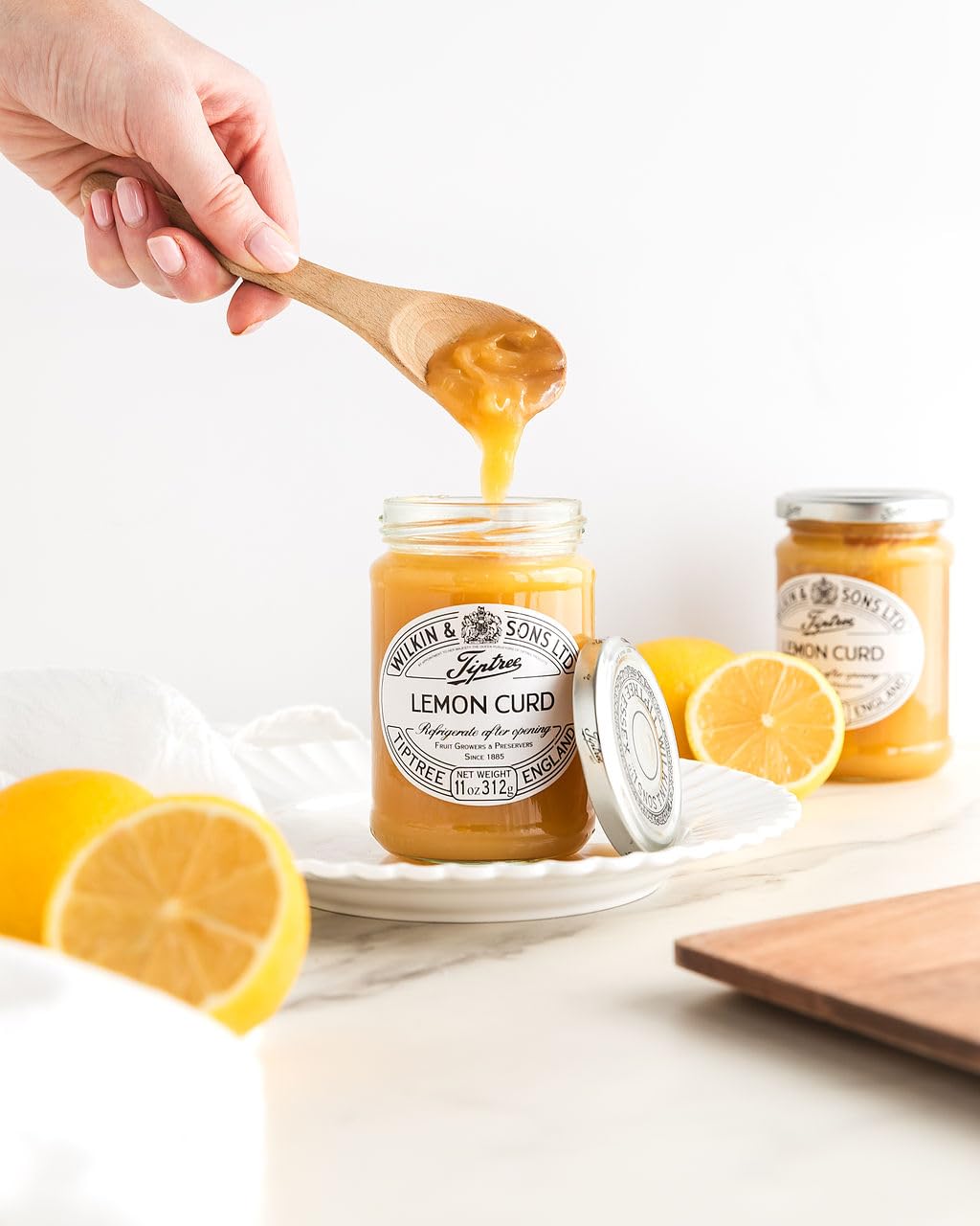 Heritage of the Wilkin family and farm-sourced ingredients in Tiptree Lemon Curd.