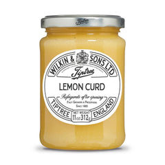 Tiptree Lemon Curd jar with vibrant label, ideal for toast and pastries.