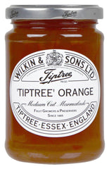 Tiptree Orange Marmalade jar on a breakfast table, ideal for toast and pastries with Seville orange flavor