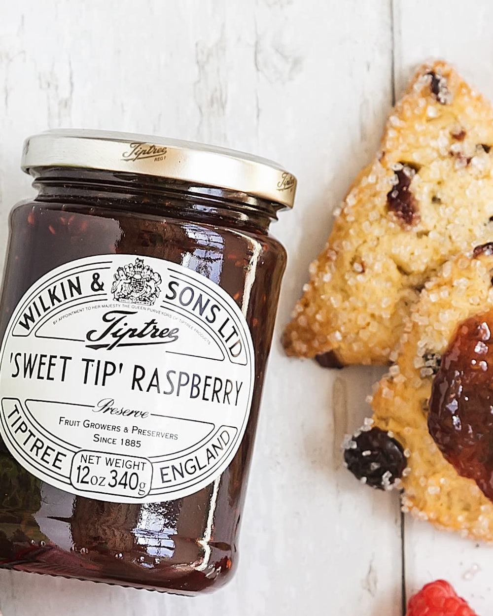Tiptree Raspberry Preserve with visible seeds and glossy texture in a bowl