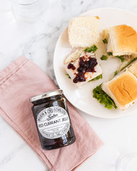 Tiptree red currant jelly on toast close-up highlighting vibrant color and rich sweetness.