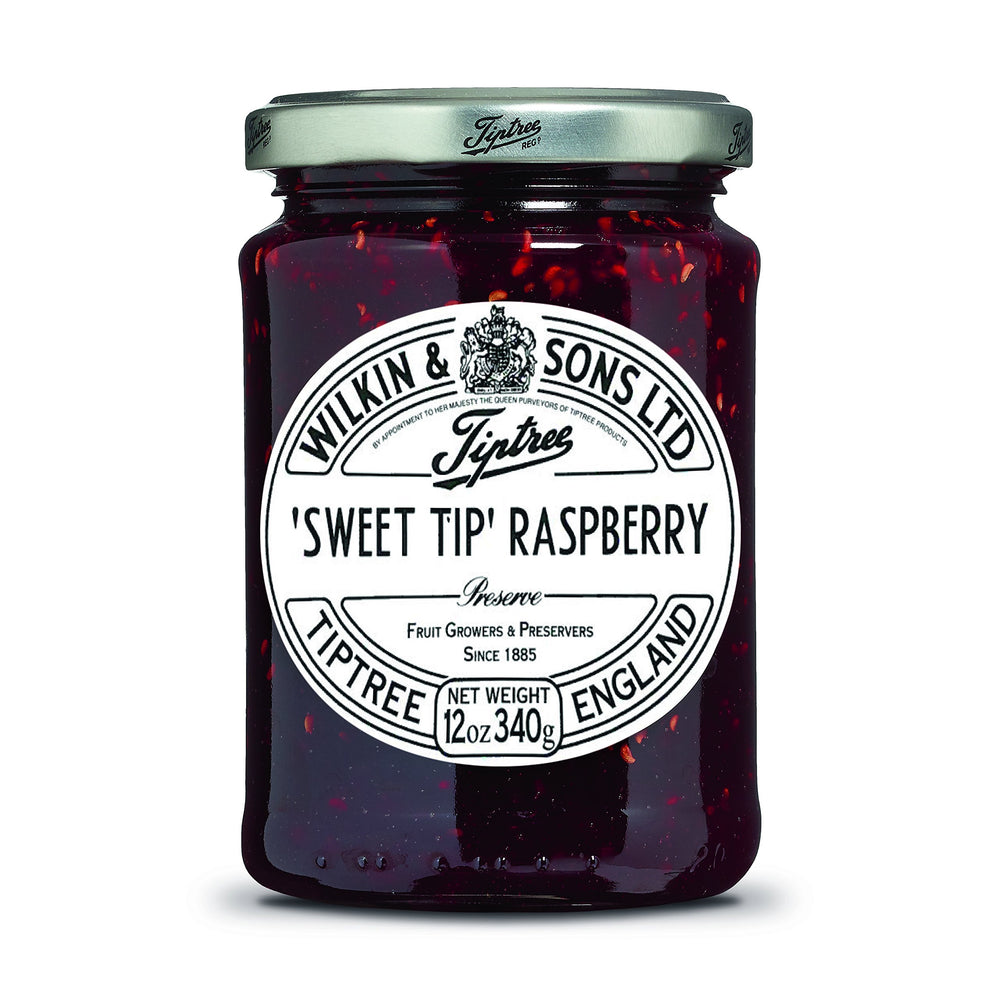Tiptree Sweet Tip Raspberry Preserve jar on shelf showing premium fruit and craft