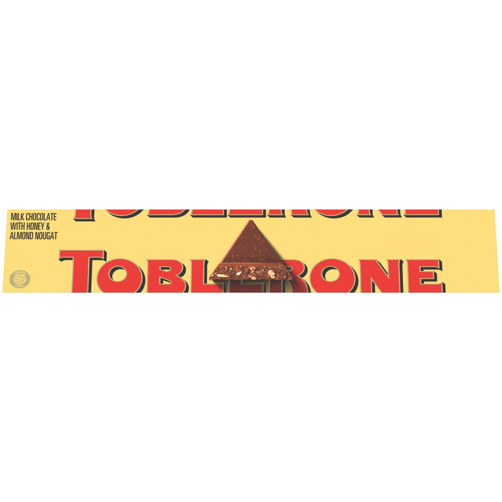 Toblerone milk chocolate bar with honey and almond nougat, iconic triangular peaks.