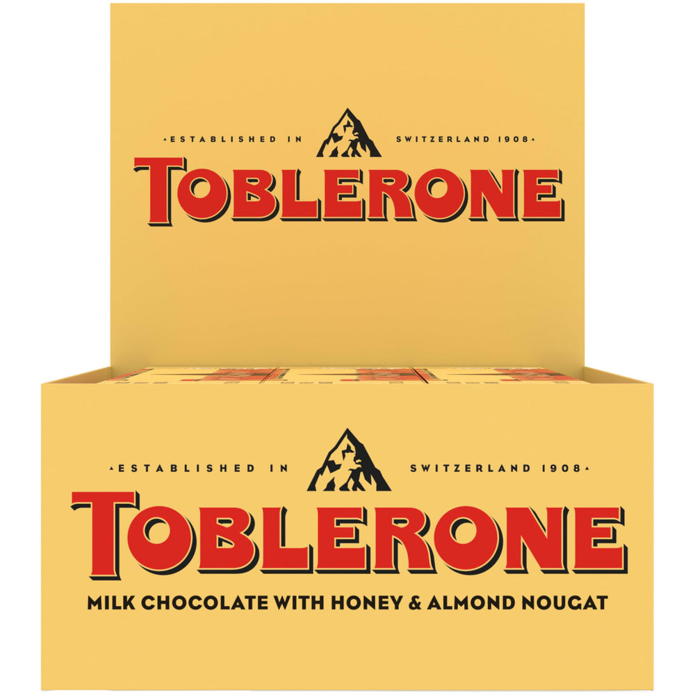 Toblerone Milk Chocolate Bar triangle peak close-up reveals honey almond nougat inside, ideal for sharing.