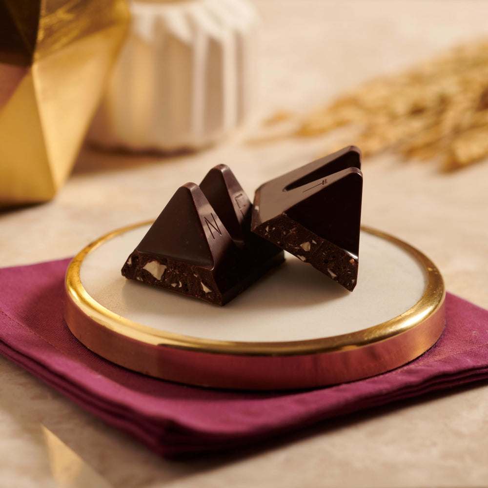 Gift basket featuring Toblerone dark chocolate.