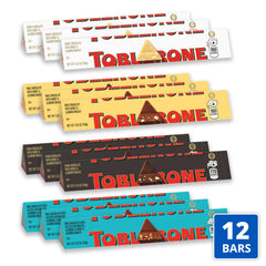 TOBLERONE white chocolate bar with triangular peaks, creamy sweetness for dessert moments.