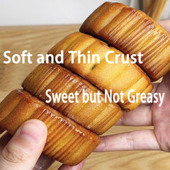 Toega honeydew filling mooncake, pale green interior with refreshing sweetness.
