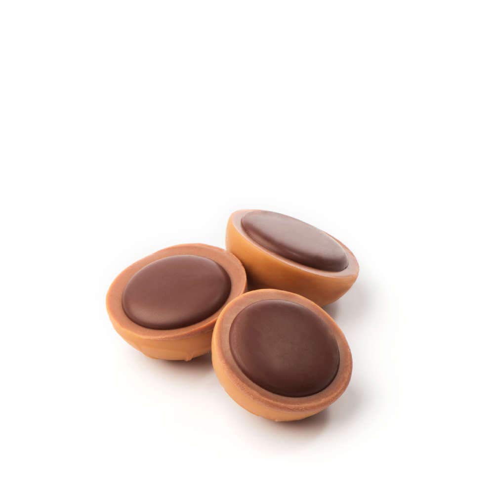 Toffifee chocolate-topped caramel layer highlights premium flavor.