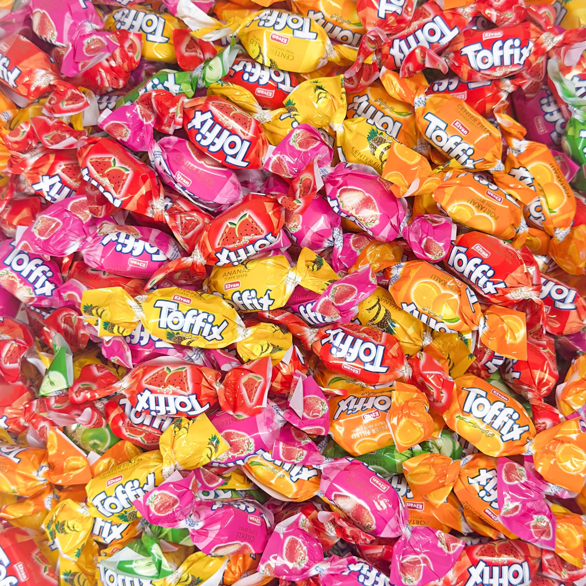 TOFFIX Fruit Chews pineapple center-filled bite for tropical refreshment.