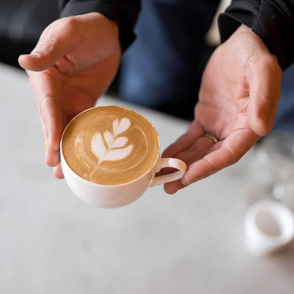 Tokyo Coffee Organic Blend cup with steam signals fresh aroma and flavor