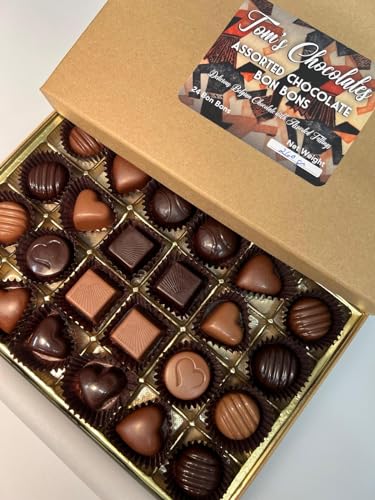 Tom's Chocolates 24-piece selection showing varied fillings and flavors