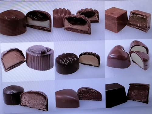 Milk, dark, and white chocolate assortment arranged attractively by Tom's Chocolates