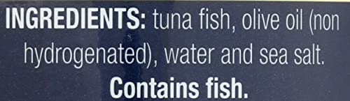 Tonnino tuna with olive oil close-up label showcases quality ingredients.