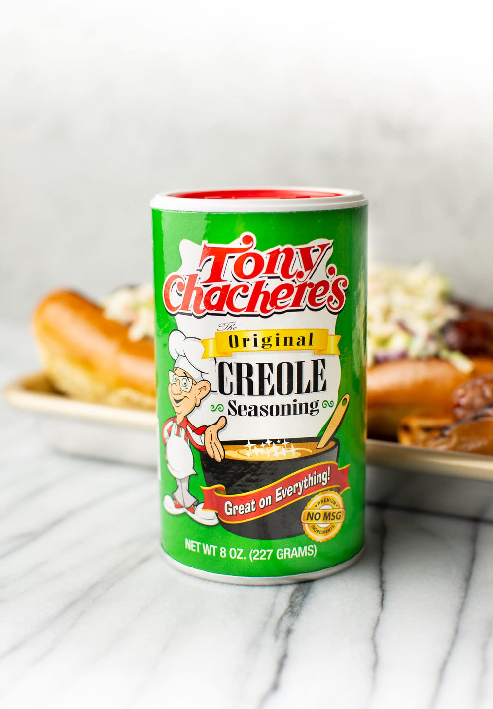 Tony Chachere's Creole Seasoning Original used on meat to elevate savory flavor.