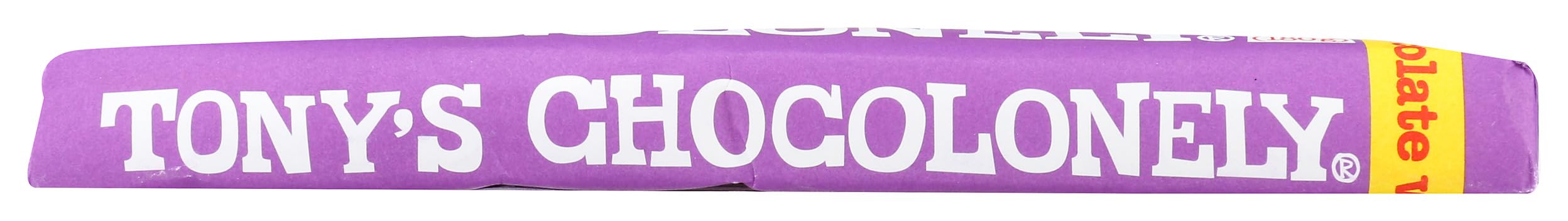 Tony's Chocolonely Milk Chocolate Chip Cookie Bar on desk, perfect snack during work.