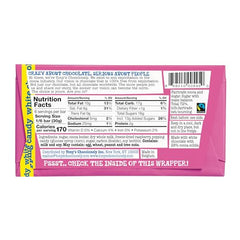 Close-up of Tony’s Raspberry Popping Candy bar showing popping candy and tangy flavor.