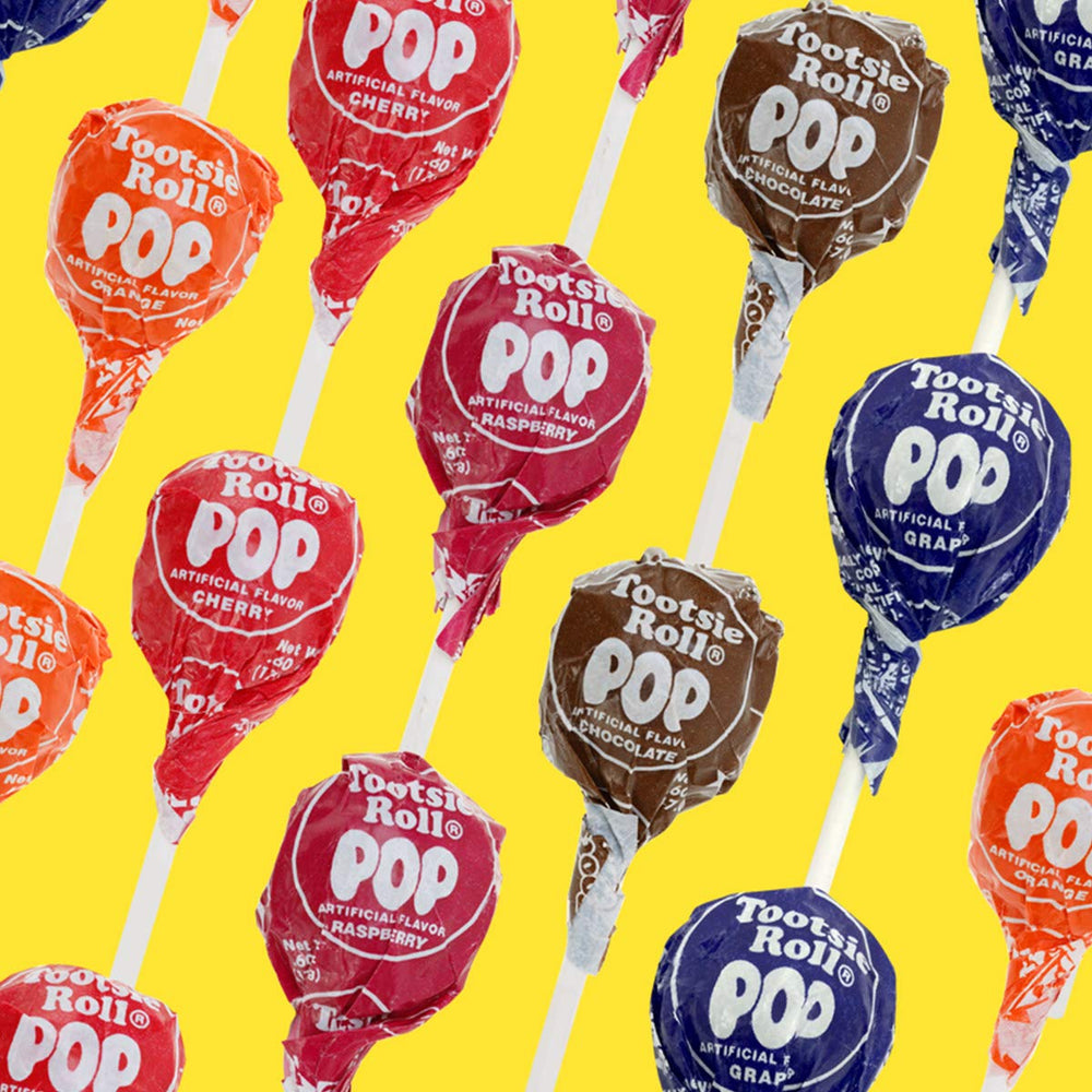 Tootsie Pops center closeup highlights chewy core, nostalgic treat for every occasion.