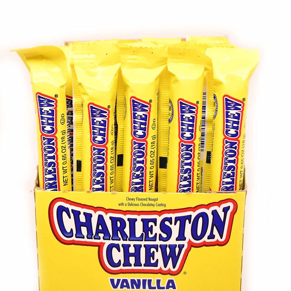 Tootsie Roll Charleston Chew vanilla bar cracked open, chewy center exposed.