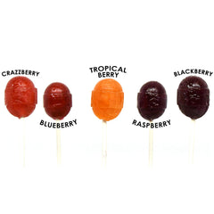 Tootsie Roll Charms Blow Pops bursting berry close-up of flavors and glossy shell