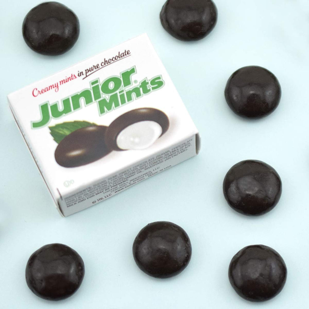 Mini box close-up showing creamy mint centers inside chocolate.