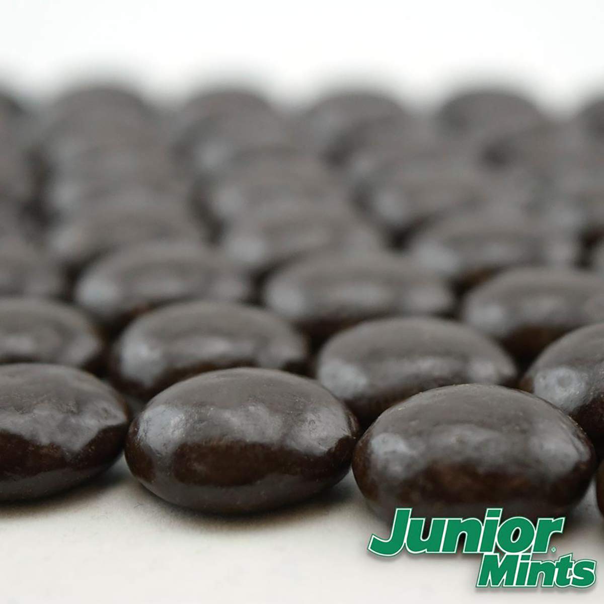 Tootsie Roll Junior Creamy Mint center and chocolate coating close-up.