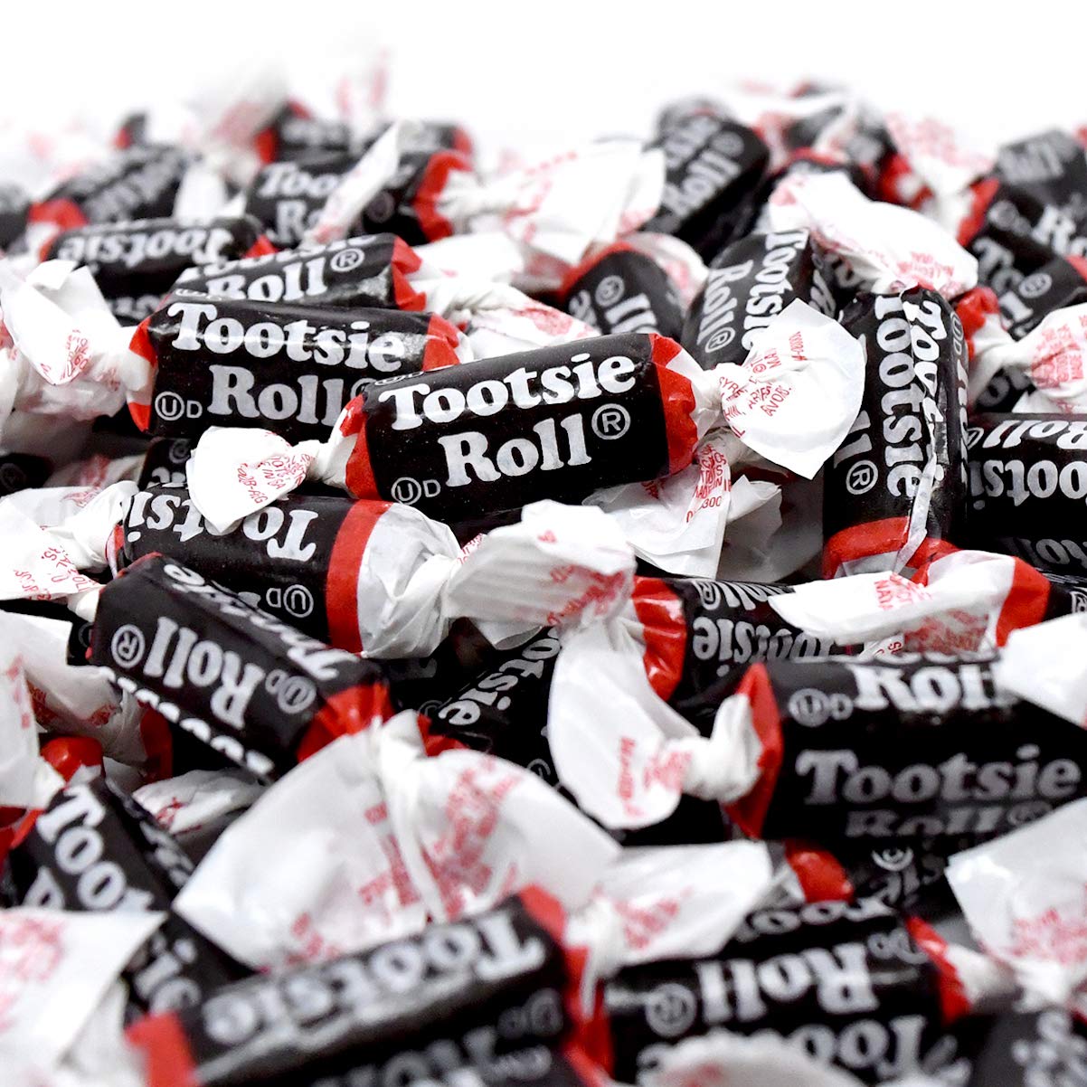 Tootsie Roll Midgees candies close-up, chewy chocolate minis for snacking