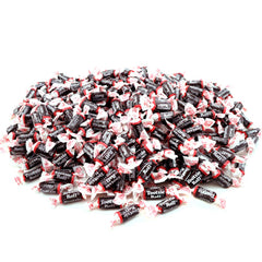 Tootsie Roll Midgees candies in hand, perfect treat for classrooms and parties.