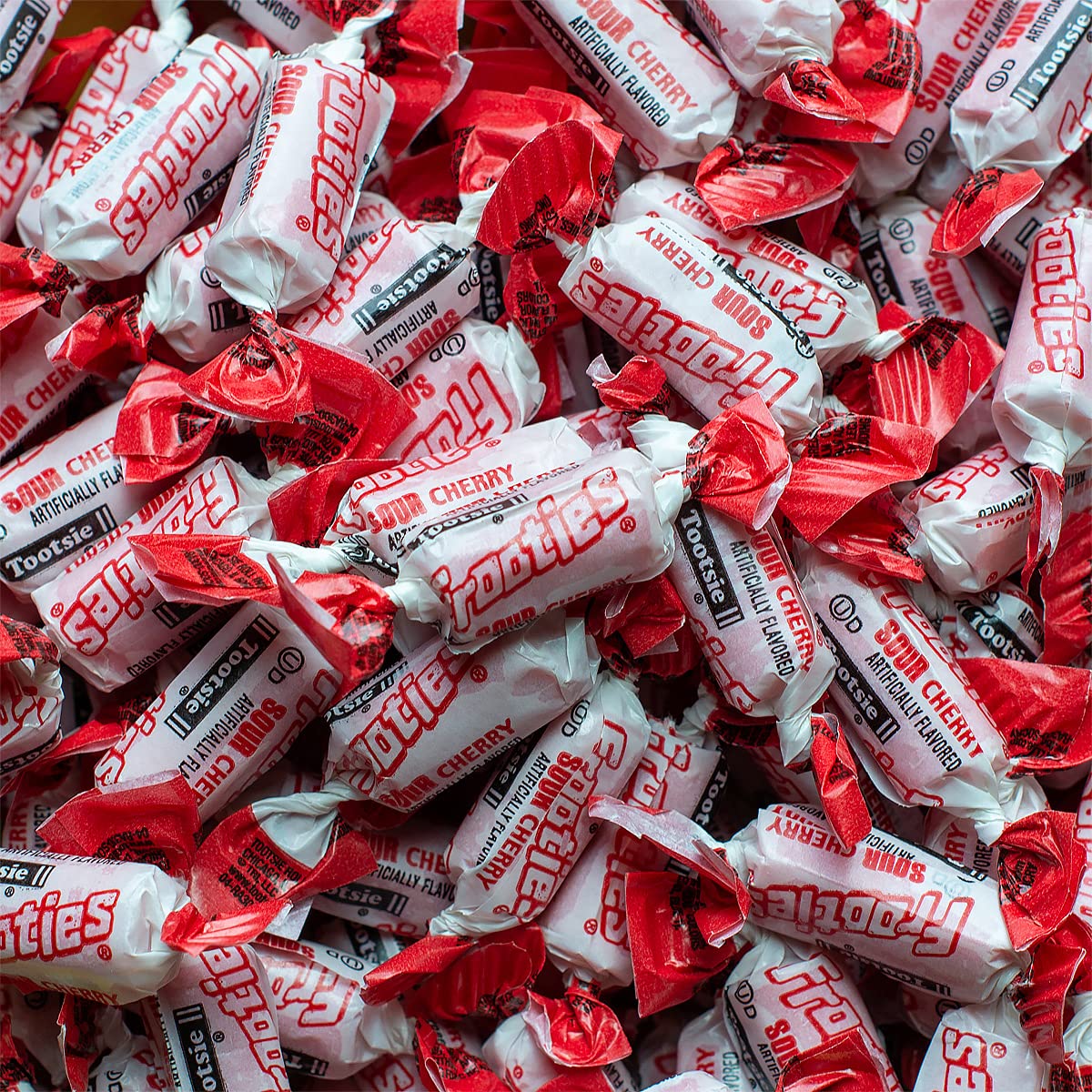 Tootsie Roll Sour Frooties red wrappers highlighting individually wrapped candy